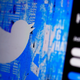 Twitter's splash screen is shown on a desktop computer.